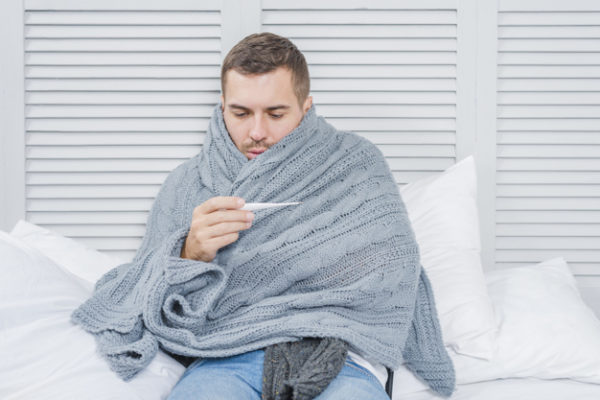 http://creative.astraone.io/files/sick-man-wrapped-in-shawl-looking-at-thermometer_23-2147948499-600x400.jpg